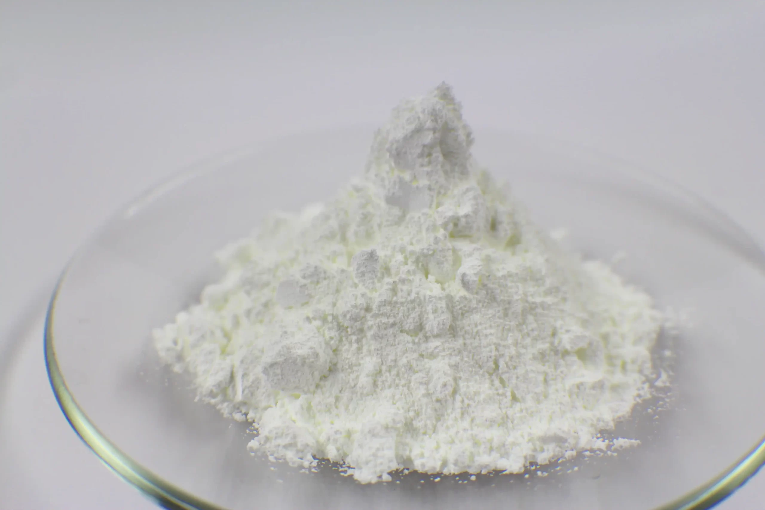 White powdered chemical substance on a laboratory dish.